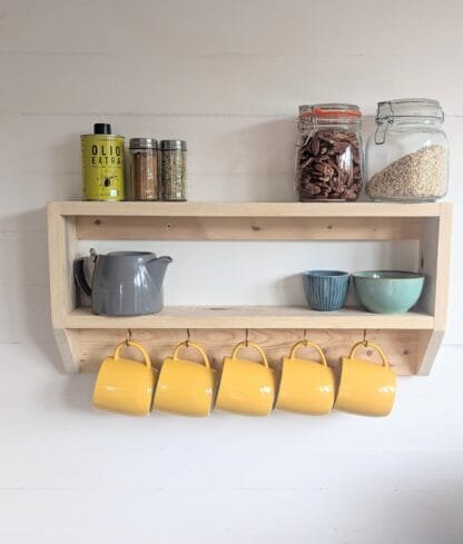 rustic reclaimed wooden kitchen mug shelf.