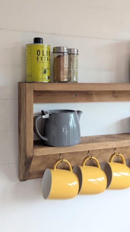 rustic reclaimed wooden kitchen mug shelf.