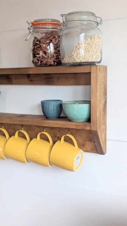 rustic reclaimed wooden kitchen mug shelf.
