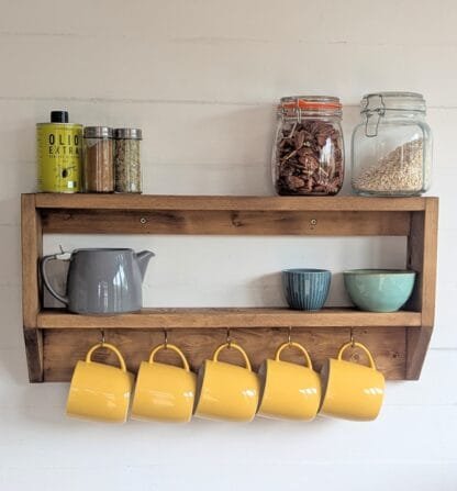 rustic reclaimed wooden kitchen mug shelf.