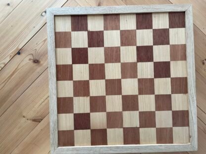 Handmade draughts set made of reclaimed hardwoods by crowfoot salvage