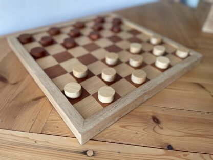 Handmade draughts set made of reclaimed hardwoods by crowfoot salvage