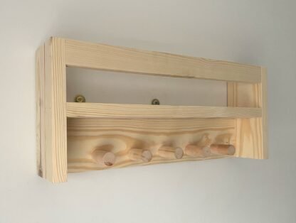 Nursery shelf with hanging space.