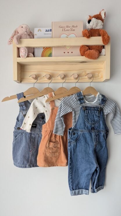 Nursery shelf with hanging space.