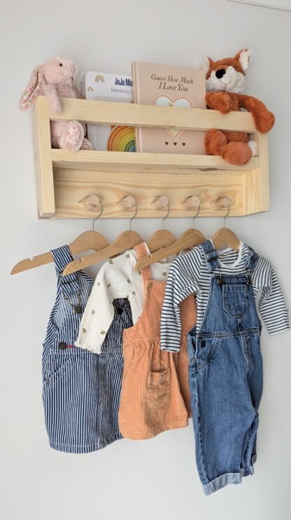 Nursery shelf with hanging space.